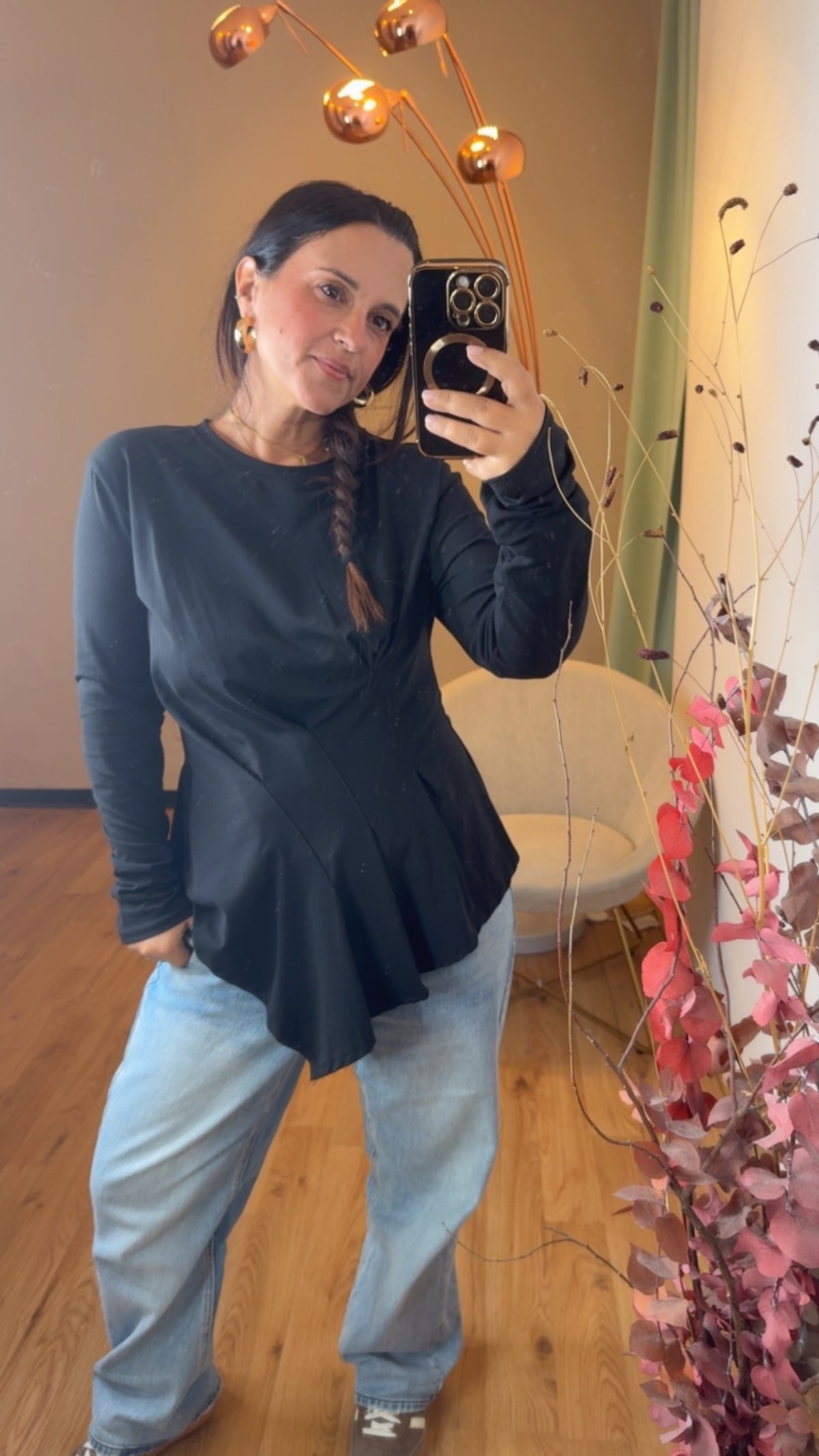 Maglia in cotone nera con drappeggio
