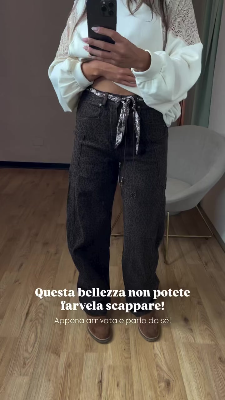 Jeans animalier con cintura